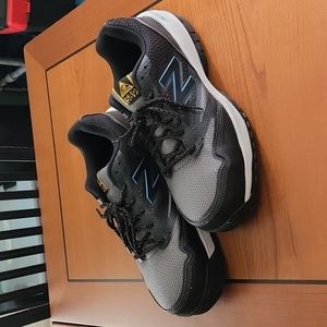 New Balance composite toe shoes